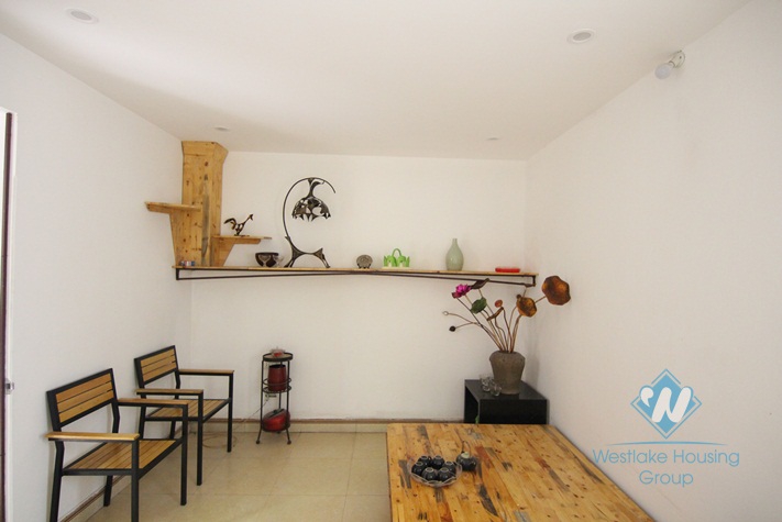 Tiny artisan's house with a balcony for rent in Tay Ho